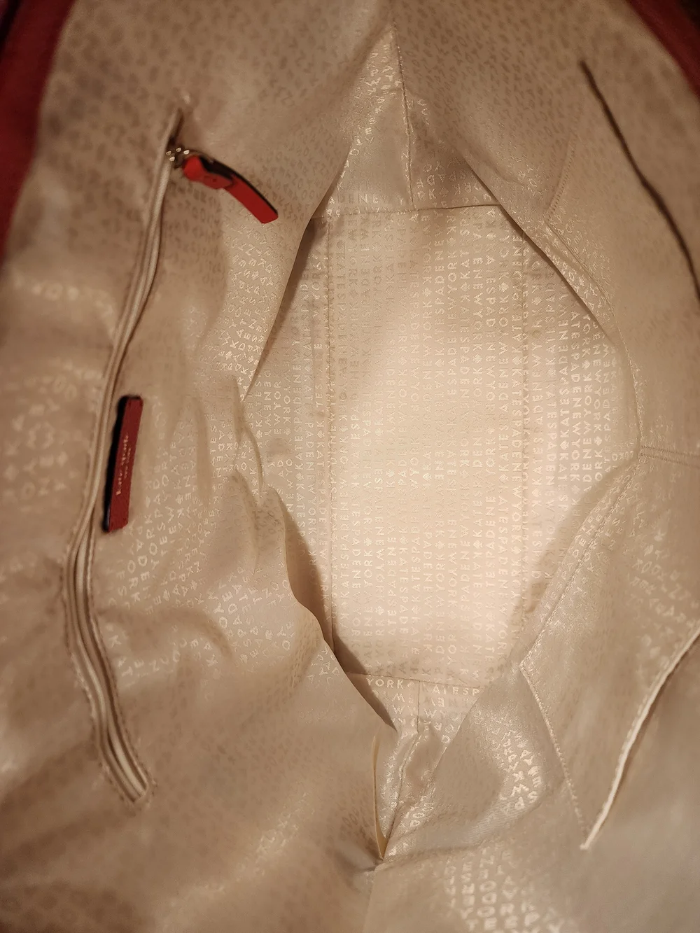 This Kate Spade Larchmont Avenue Logo Penny Tote in chili red